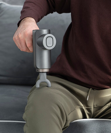 Massage gun on knee