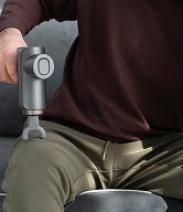 Massage gun on knee